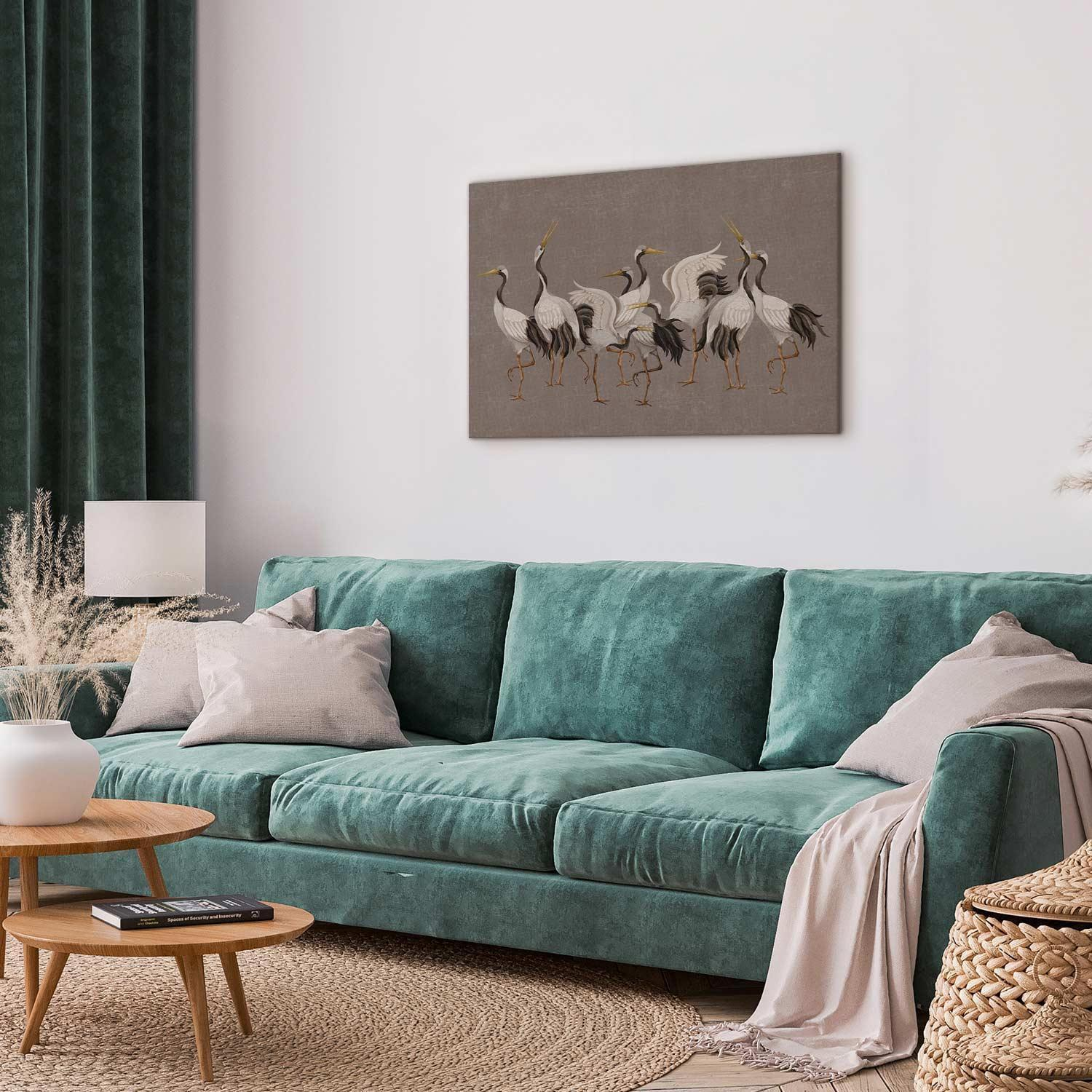 Quadro - Crane dance – bright silhouettes of birds against a warm grey background with texture